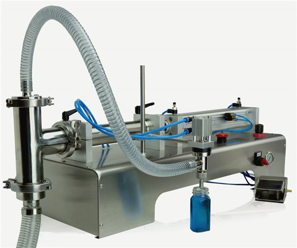 Machine de remplissage d'huile de lubrification de doubles têtes de contrôle pneumatique